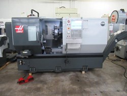 Haas ST-30 CNC Turning Center with Live Milling, C-Axis Programmable, Tailstock, Parts Catcher, Haas Servo Bar Feed, Chip Conveyor, Tool Presetter