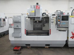 Haas VF-4 CNC Vertical Machining Center with 15,000 RPM Spindle, 24 Station ATC, 4th Axis Drive