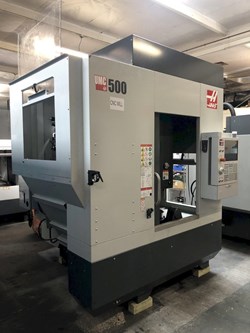 Haas UMC-500 5-Axis Vertical Machining Center 2022 equipped with 10,000 RPM Spindle, 30+1 Tool ATC, High-Speed Machining, 95 Gallon Coolant Tank, CDF Belt-Type Chip Conveyor, Chip Strainer Tray Filter