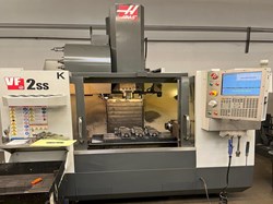 Haas VF-2SS CNC Vertical Machining Center 2010 equipped with Programmable Coolant, Multi Chip Auger, Coolant Thru Spindle, 4th Axis Drive, Table Probe, Rotary NOT Included