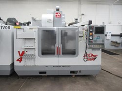Haas VF-4 CNC Vertical Machining Center, 10K Spindle, 2-Speed Gearbox, 24 Station Twin-Arm ATC, Chip Auger