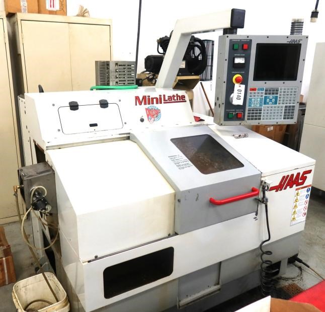 HAAS MINI LATHE GANG TYPE CNC LATHE HAAS MINI LATHE PressXchange Haas mini lathe gang type cnc lathe haas mini lathe pressxchange